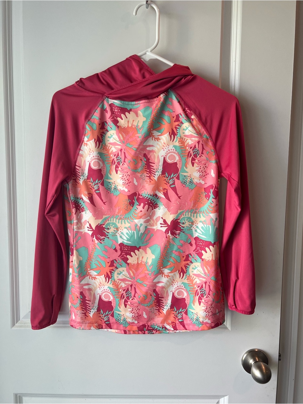 Patagonia Kids Capilene hoodie in Pink with Tropical Print. Large